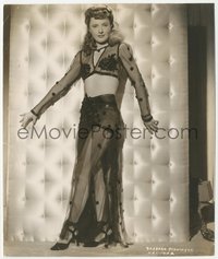 7p1397 LADY OF BURLESQUE 7.25x8.75 still 1943 sexy Barbara Stanwyck in skimpy harem girl outfit!