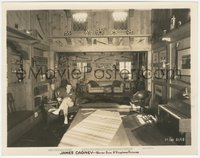 7p1386 JAMES CAGNEY 8x10 still 1934 at home in his study where all his guns & blades are displayed!