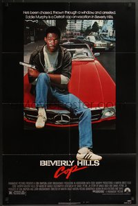 7p0235 BEVERLY HILLS COP NSS style 1sh 1984 great image of detective Eddie Murphy sitting on red Mercedes!