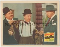 7p0788 BULLFIGHTERS LC 1945 Oliver Hardy removes Stan Laurel's coat as Ralph Sanford threatens them!