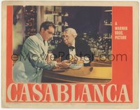 7p0789 CASABLANCA LC 1942 S.Z. Sakall tends to Paul Henreid's wounds after the Resistance meeting!